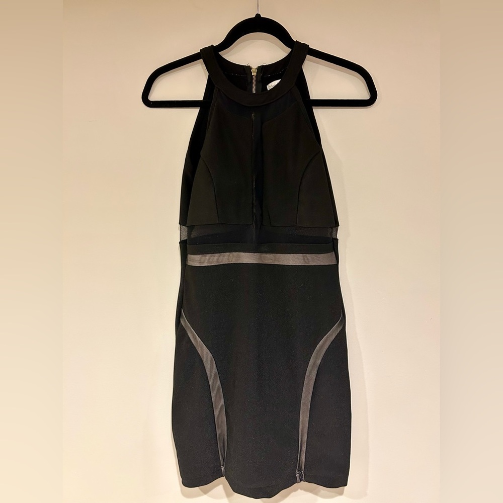 Stretchy Black Dress. Sheer areas